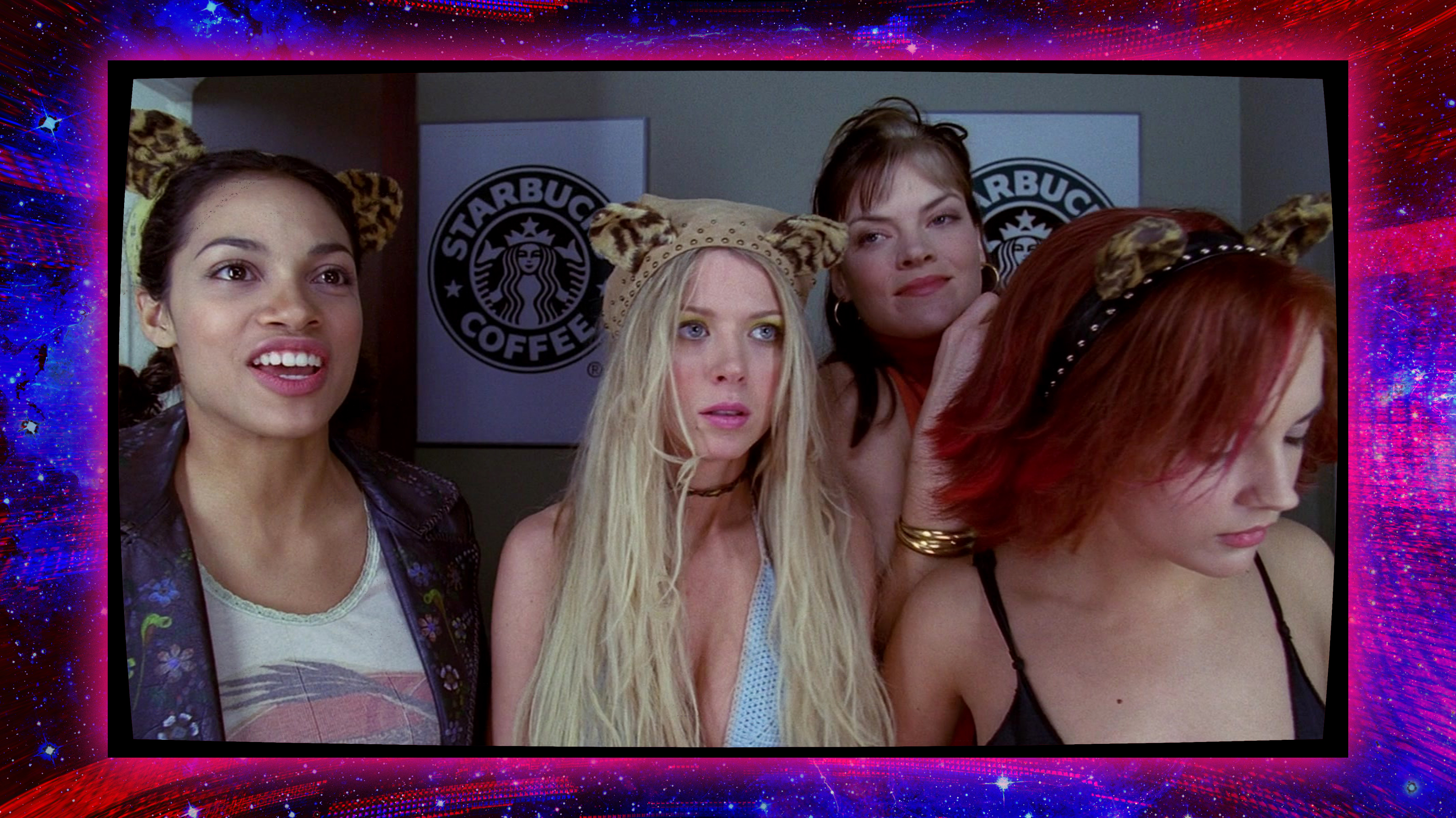 Image of the four women from the Josie and the Pussycats movie on a vibrant background